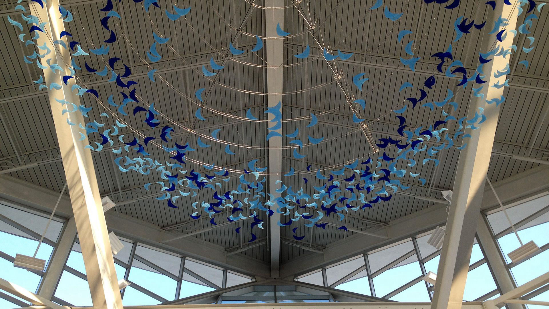 Dream of Flight stainless steel stained glass public art sculpture by Heath Satow RDU Airport NC