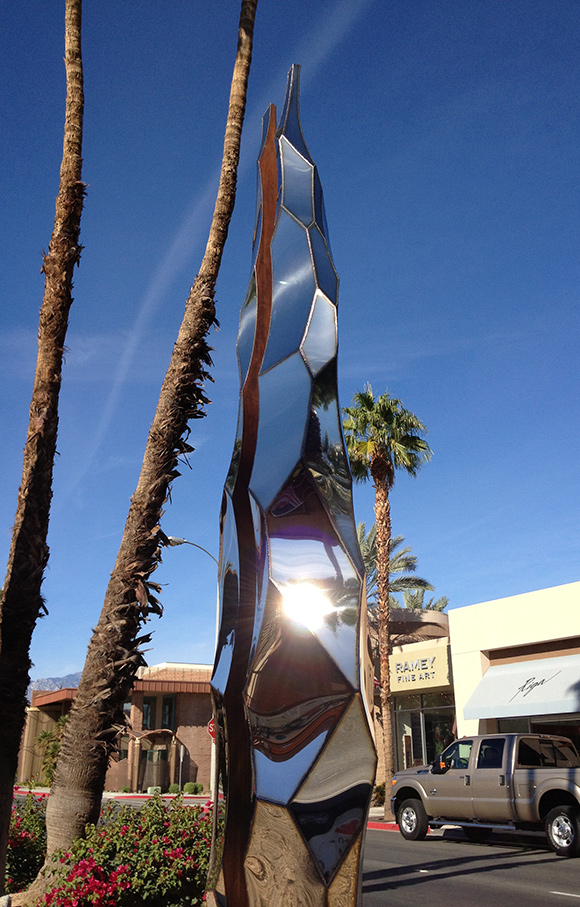 stainless steel sculpture with oxidized steel