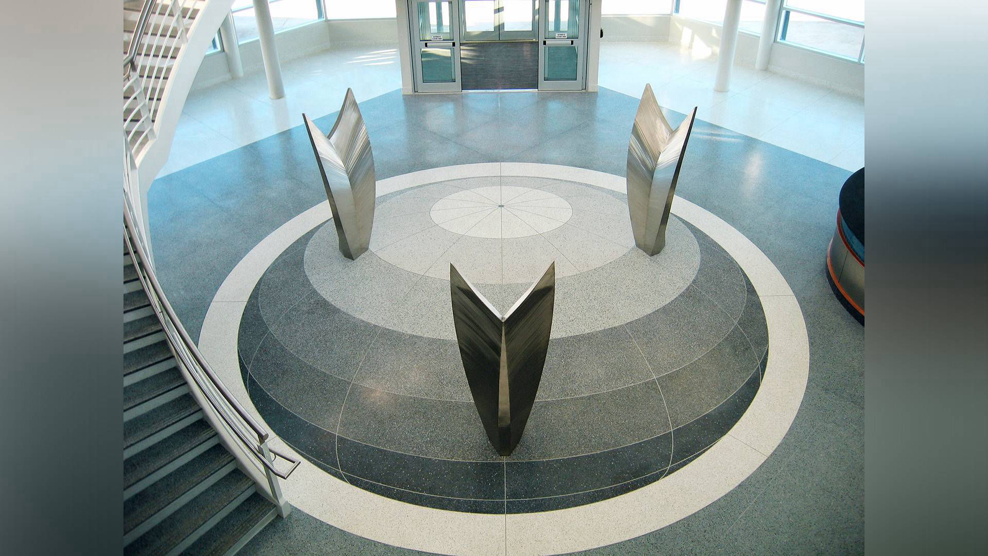Dream of Flight stainless steel stained glass public art sculpture by Heath Satow RDU Airport NC