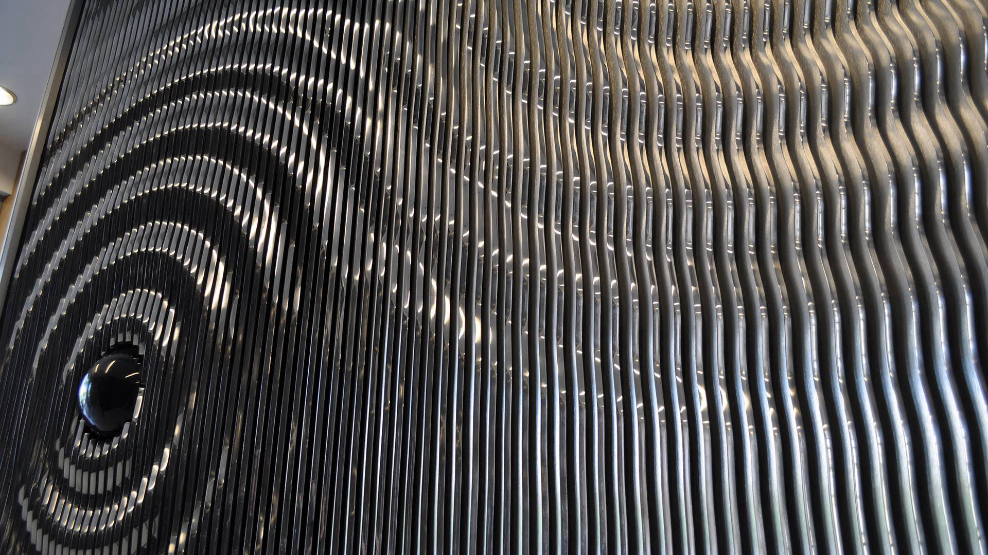 Ripple - mirror polished aluminum public art sculpture by Heath Satow Los Angeles CA