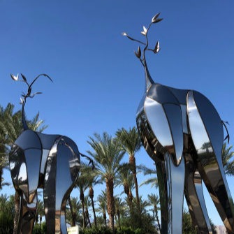 Sequitur - polished stainless steel public art in Indio, CA by Heath Satow