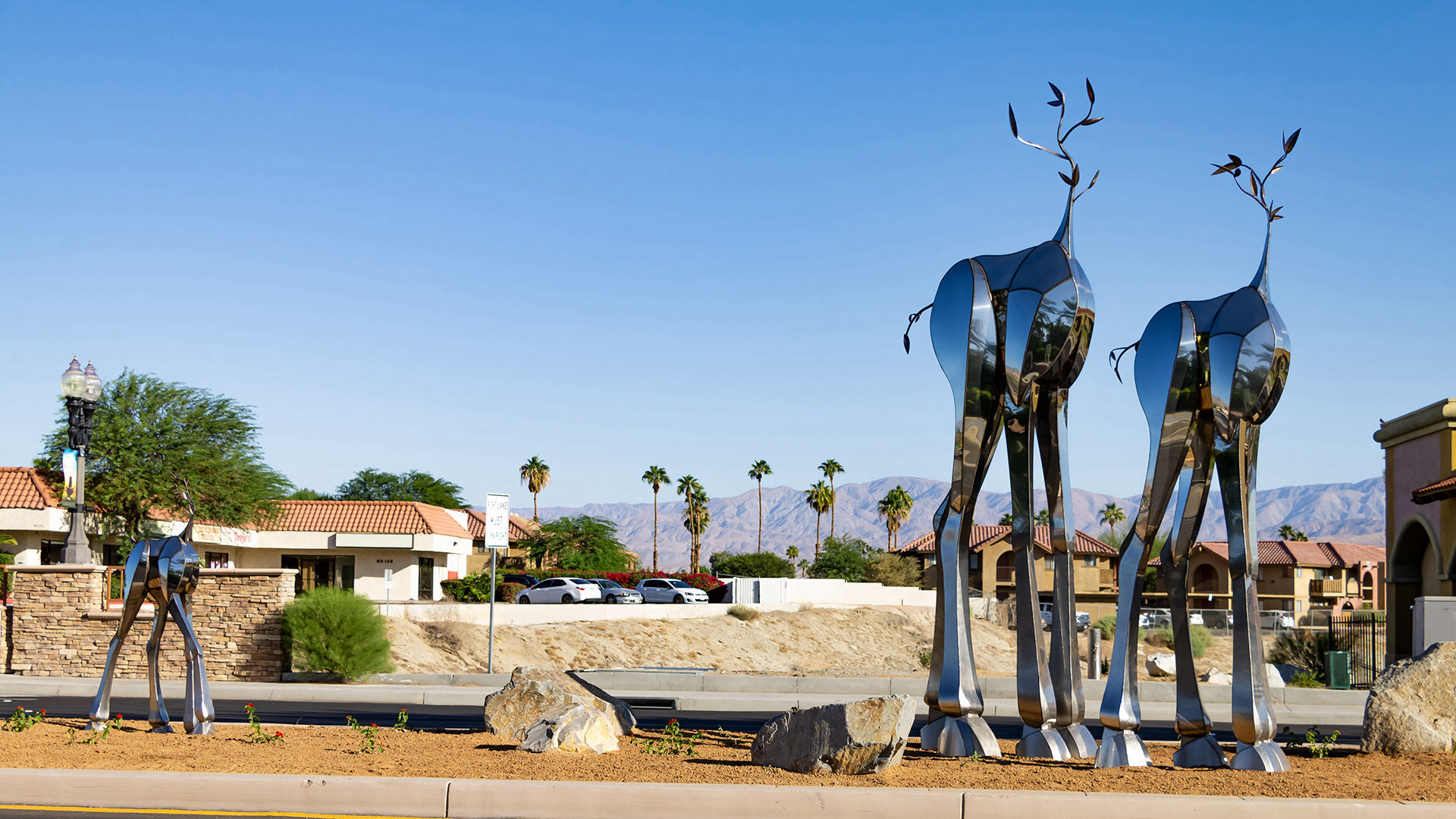 Sequitur - polished stainless steel public art in Indio, CA by Heath Satow