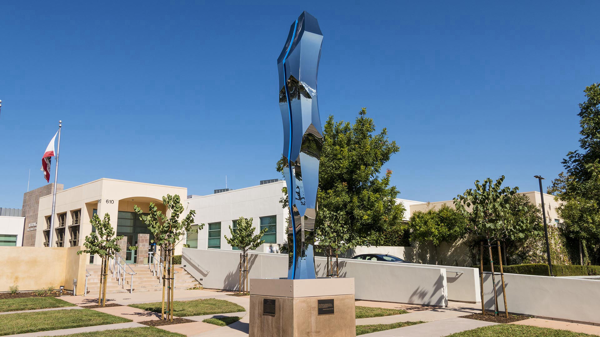 Thin Blue Line - polished stainless steel public art sculpture by Heath Satow in Moorpark, CA