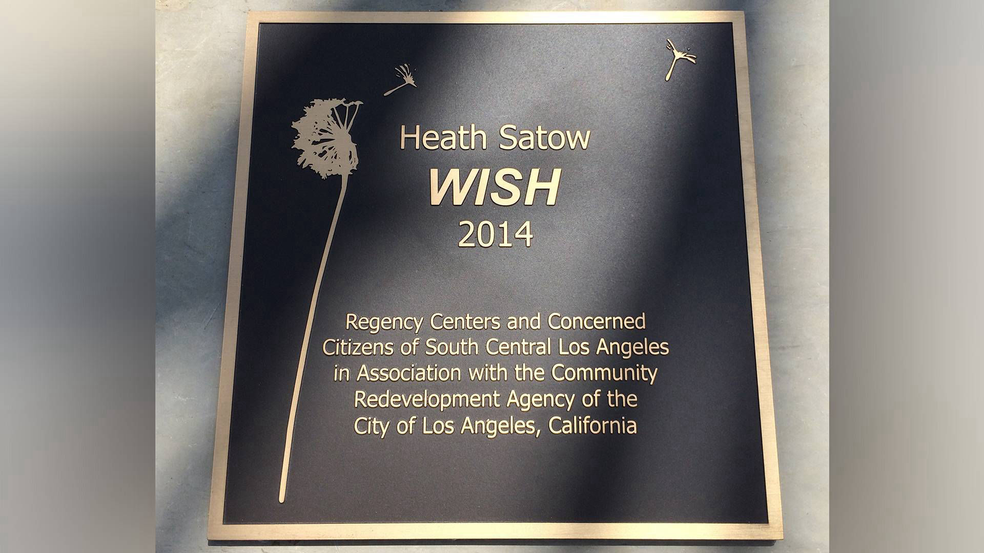 Wish - corten stainless steel public art dandelion sculpture by Heath Satow Los Angeles CA