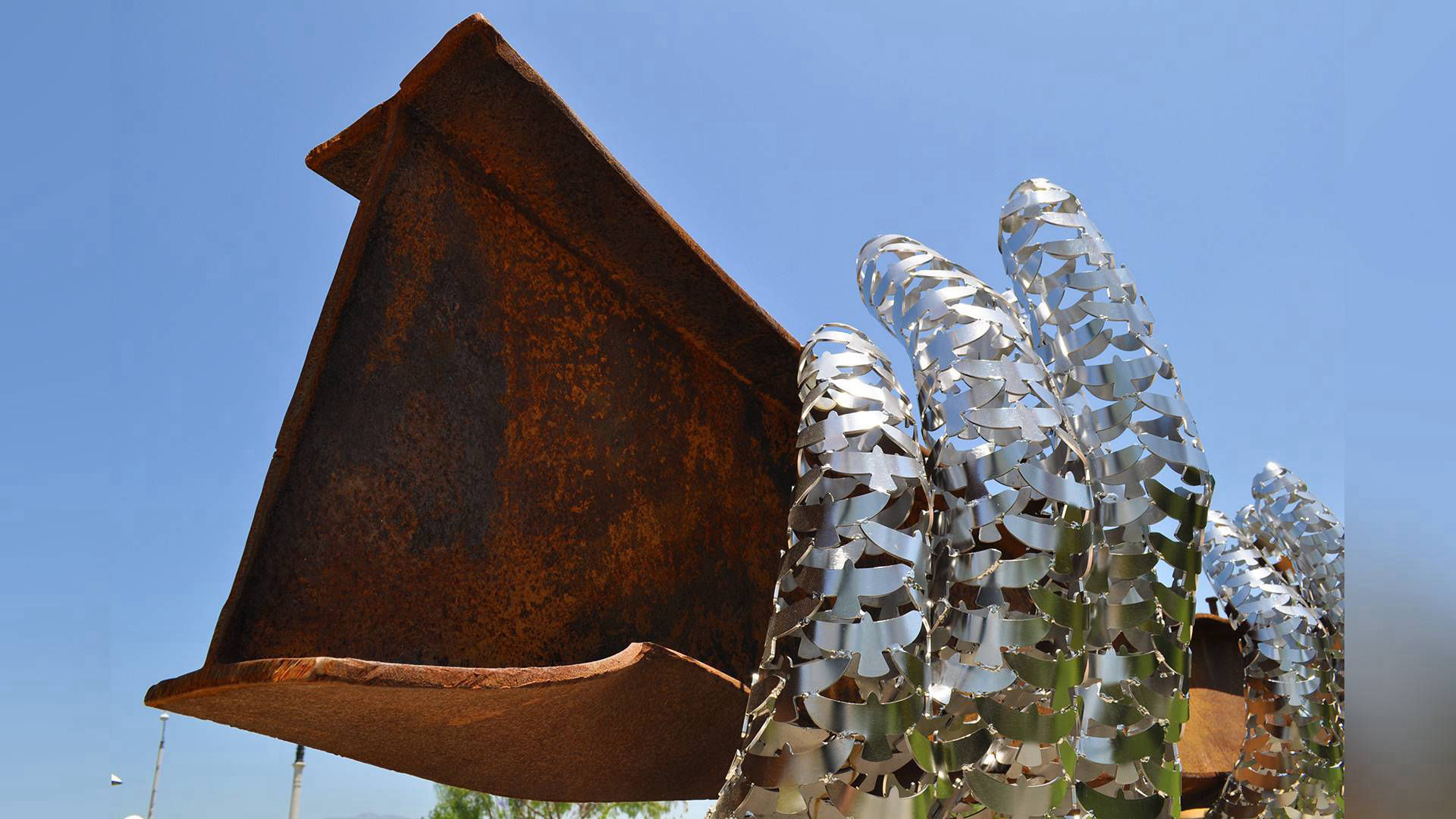 Reflect, a 9/11 Memorial — stainless steel and beam from World Trade Center public art sculpture by Heath Satow, Rosemead, CA