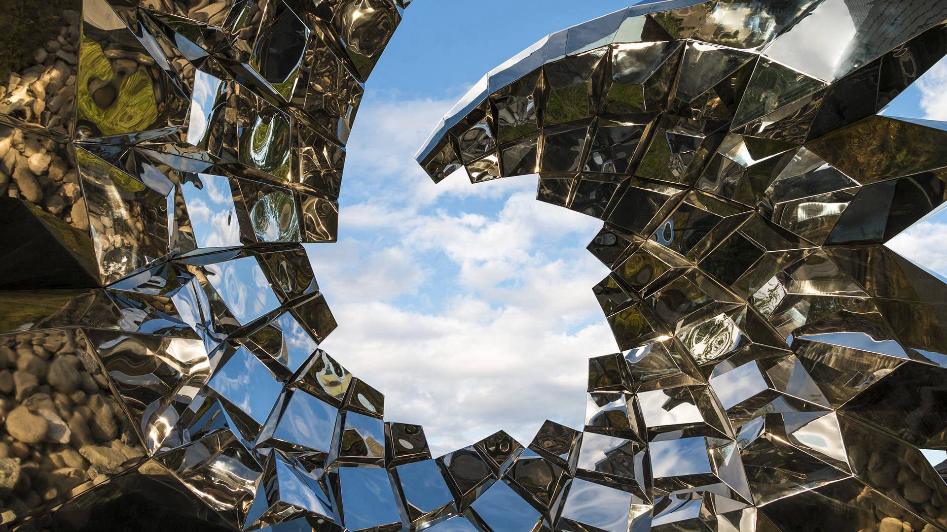 Inflorescence — mirror-polished stainless steel public art sculpture by Heath Satow, Anchorage, AK